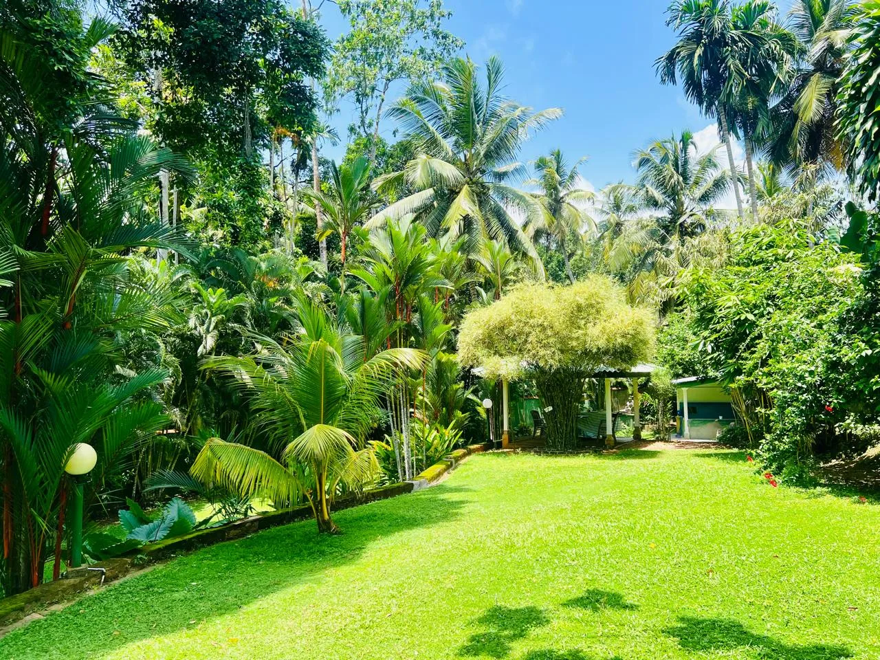 Sterrling Villa spacious back garden with outdoor seating area