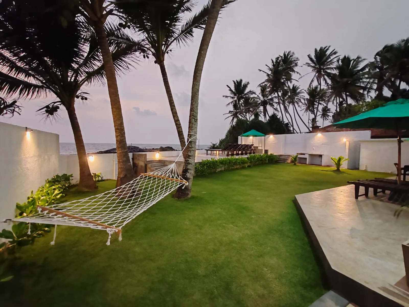 Villa One 64 second floor bedroom with ocean-facing sitting area